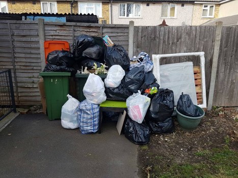 Builders removing construction waste from a site in Bethnalgreen